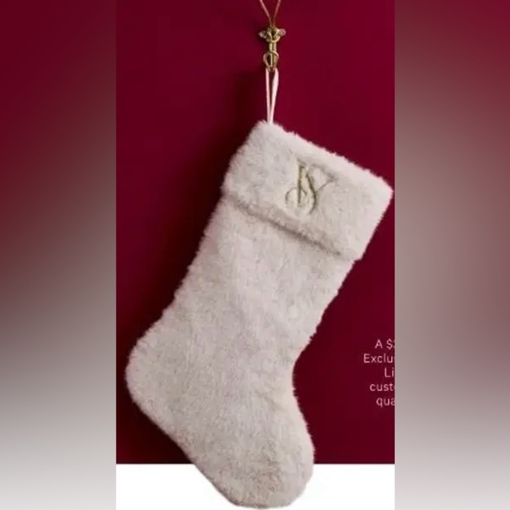 Victoria’s Secret soft fur Christmas stocking in a light cream neutral color VS